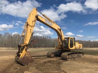 Selling Off-Site - 2000 John Deere 270LC Excavator c/w Diesel, Cab, 64 In. Clean Up Bucket, 34 In. TBG, Showing 8,975 Hours, SN FF0270X070762 **Located Off Site Near West Cove, AB, Contact Richard at 780-222-8309 For More Information**
