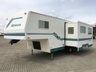 High River Location - 2000 Okanagan OK-25-5R 27 Ft. Fifth Wheel Trailer c/w A/C, Furnace, Hot Water Tank, Fridge, Stove, Microwave, Double Sink, Large Slide For Dinette and Couch, VIN 2T9T5T253X1997335 *Note: Manuals In Office*