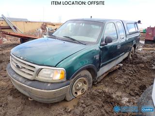 Selling Off-Site - 2000 Ford F-150 XL 4X4 Extended Cab Pickup c/w 4.6L Triton V8, A/T, LT265/75R16 Tires, Canopy, VIN 2FTRX18W6YCA41819 *Note: Parts Only, Flat Tires, Bill of Sale Only* **Located Offsite at 21220-107 Avenue NW, Edmonton, For More Information Contact Richard at 780-222-8309**