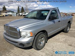 High River Location -  2004 Dodge Ram 1500 Pickup c/w 5.7L V8, A/T, A/C, Spray On Box Liner, Tow Hitch Receiver, 265/70R17 Tires, Showing 280,892 Kms, VIN 1D7HA16D24J112093 *Note: Engine Light On*
