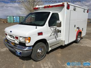 High River Location -  2002 Ford Econoline E350 Ambulance c/w 7.8L V8 Turbo Diesel, A/T, A/C, Engine Battery, (3) Auxiliaries, Handheld Spot Light, Emergency Lights, PA System, Rear Double Door, Side Door, 225/75R16 Tires, Showing 150,479 Kms, VIN 1FDWE35F02HA22073