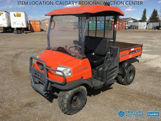 High River Location -  2011 Kubota RTV900 Utility Vehicle c/w 3 Cyl Diesel, Heater, EROPS, Front Bush Bar, Manual Lift Dump, 26x10R12 Front, 26x11R12 Rear Tires, Showing 4448 Hours, VIN A5KB1FDACBG0C5246 *Note: 2wd/4wd Engagement Requires Repair, Blue Exhaust Smoke*