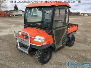 High River Location -  2010 Kubota RTV900 Utility Vehicle c/w 3 Cyl Diesel, Heater, EROPS, Front Bush Bar, Manual Lift Dump, 25x10R12 Front, 25x11R12 Rear Tires, Showing 5819 Hours, VIN A5KB1FDAPAG0B0084 *Note: Not Engaging Hi Gear*