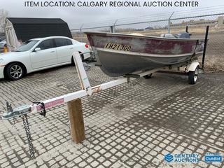 High River Location - Lund WC-14 Aluminum Fishing Boat c/w Yamaha .5L 4 Stroke 4 HP, 2001 EZ Loader  S/A Trailer 2 In. Ball, 4 Pin Connector, Boat S/N 1H21300, Trailer S/N 1ZEAAHGB11A116243. (2) Life Jackets, Fish Finder & Down Rigger In Office.