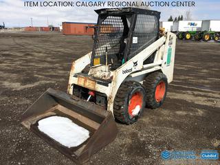 High River Location - 1978 Clark Bobcat 632 Skid Steer Loader c/w Ford 4 Cyl Gas, ROPS, 60 In. Bucket, 10-16.5 Tires, Showing 210 Hours, VIN 4993-M-13011 *Note: Engine Oil Leak, Bolt Missing That Holds On Bucket*
