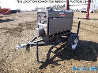 Fort Saskatchewan Location - 2006 Lincoln Classic 300D K1643-3 Trailer Mounted Diesel Welder c/w Perkins HP32 Engine, 2 In. Ball, ST205/75D14 Tires, Showing 5,703 Hours, SN C1060200063 *Note: Year APO*