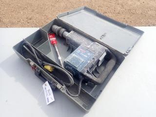 Bosch Model 11311EVS Hammer Drill C/w 1in X 12in Concrete Chisel. SN 9720272