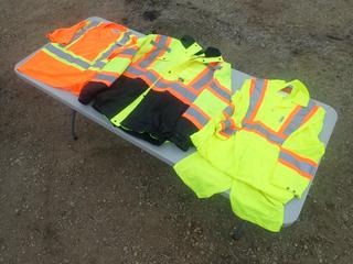 (1) STIHL Size Large Reflective T-Shirt C/w (1) Pair Of Storm Master Size Small Coveralls And (1) Size Large 2 in 1 Winter Jacket
