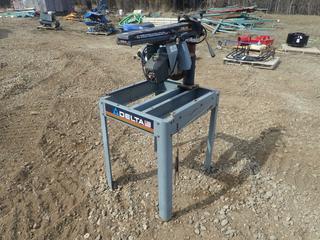 Delta 120/240V 10in Radial Arm Saw C/w 30in X 25in X 32 1/2in Stand And Blade *Note: Working Condition Unknown*
