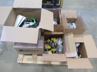 (7) Boxes of Assorted Electrical Supplies Includes Switches, Smoke Detectors, Photocell Lights, Safeway Light w/ Cages, Clamp Lights, Shrouds and Grab Tree Polestar 230V Breaker Panels (T-3-1)