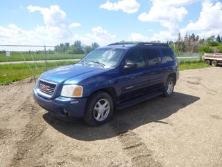 2005 GMC Envoy 4X4 SUV c/w 4.2L Vortec, A/T, A/C, 245/65R17 Tires at 40%, Showing 301,665 Kms, VIN 1GKET16S756152877 *Note: Damage to Front and Rear Bumpers, Rear Hatch, Cracked Windshield, Wipers Stay On, E-Brake Light On, Engine Light On*