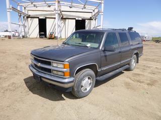 1999 Chevrolet Suburban 4X4 SUV c/w 5.7L V8 Vortec, A/T, A/C, Leather, Tekonsha Trailer Brake System, 235/85R16 Tires at 70%, Showing 245,977 Kms, VIN 1GNFK16R5XJ548670 *Note: Boost to Start, Catalytic Converter Removed*
