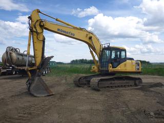 2003 Komatsu PC200LC-7L Excavator c/w 6 Cyl. Diesel, Cab, A/C, Heater, TBG, Undercarriage 60%, Q/C 60 In. Clean Up Bucket, Thumb, 31.5 In. Tracks, 10 Ft. Stick, Positive Air Shut-Off, Showing 8644 Hrs, SN A86415 *Note: Manual and Service Records Located In Office*