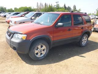 2007 Ford Escape 4X4 SUV c/w 3.0L V6, A/T, 235/60R16 Tires at 40%, Showing 132,984 Kms, VIN 1FMYU931X7KB45752 *Note: Boost to Start, Catalytic Converter Removed, Minor Damage to Front Passenger Door*