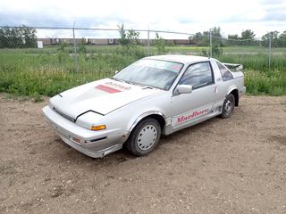 1989 Nissan Pulsar c/w 12 Valve 4 Cyl, Manual Trans, P175/70R13 Tires, VIN JN1GN34S2KW415529 *Note: Turns Over, Does Not Start, Sidewalls Cracked*