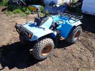 Yamaha Moto 4 ATV c/w AT22x8-10 Front Tires, 25x13.00-9 Rear Tires, VIN JY459V002GC045456 *Note: Requires Repair* **Located Offsite at 21220-107 Avenue NW, Edmonton, For More Information Contact Richard at 780-222-8309**