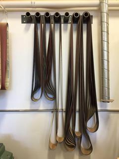 Assorted Sanding Belts c/w Steel Rack.