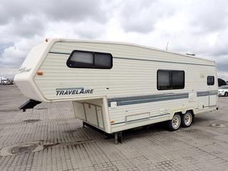 1991 Travelair TW265 5th Wheel T/A Trailer c/w A/C, Fridge, Stove, Microwave, Stereo, Bathroom, Shower, Closed Master Bedroom, Awning, 22575R15 Tires, VIN 2TT265W07N1T20167