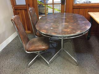 Metal Dining Table w/ (2) Matching Chairs. 48 In. L x 36 In. W x 30 In. Height.