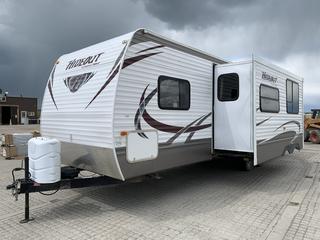 2014 Keystone Hideout 28 Ft. T/A Travel Trailer c/w Slide Out, Heat, A/C Fridge w/Freezer, Gas Oven, Microwave, DVD/CD/MP3 Player, 26 In. TV, Electric Awning, VIN 4YDT28B2XE7201193