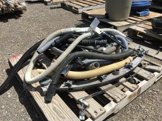 Vacuum Hoses and Scrubber Parts.