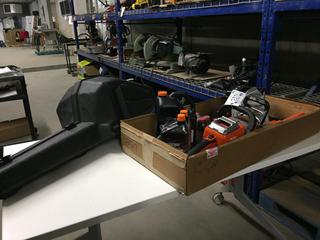 Unused Echo 58V Chainsaw c/w Battery, Oils, Charger, Case and Hats.