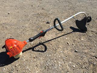 Echo Weed Trimmer, Model # GT-225 and Powerfist ATV Spreader.