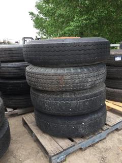 (4) Toyo Tires 10.00 R22 M-87 w/ (1) Budd Rim and (3)  Dayton Rims. 