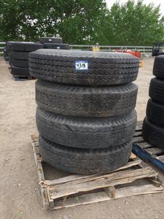 (4) Dunlop Tires 10.00 - 20 w/ Dayton Rims. *Different Treads*