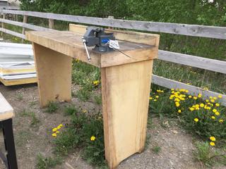 Wooden Work Table 24 In x 60 In x 42 In c/w Powerfist 4 In Swivel Base Bench Vise.