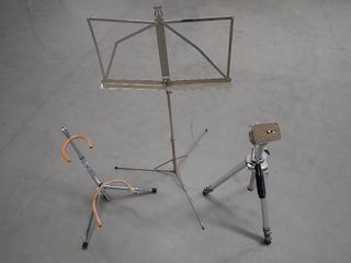 Camera Tri-Pod, Sheet Music & Guitar Stand.