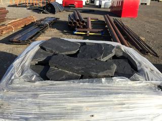 Pallet of Black Landscaping Stone.