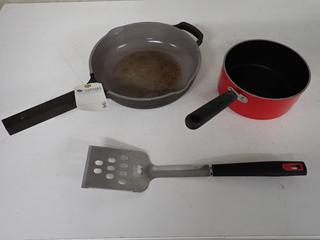 (1) Our Place 11 In Ceramic Pan, (1) Non-Stick Sauce Pan and (1) Stainless Steel BBQ Spatula.