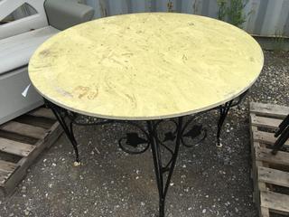 Metal/Stone Patio Table 42 In Diameter c/w (4) Chairs.