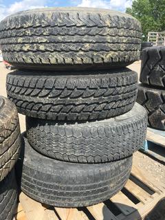 (4) Goodyear Wrangler HT Tires, LT235/85 R16 M+S c/w Rims.