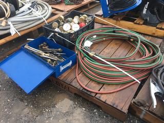 Oxy/Acetylene Cutting Equipment, (2) 25 Ft Hose, Box of Torches, Box of Regulators.