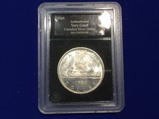 1965 Authenticated Canadian Silver Dollar.