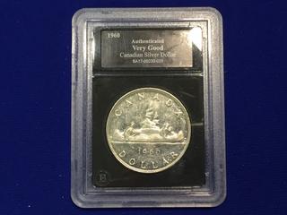 1960 Authenticated Canadian Silver Dollar.