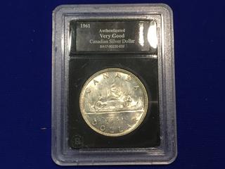 1961 Authenticated Canadian Silver Dollar.