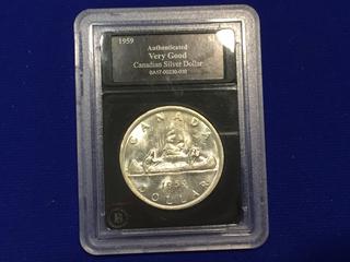 1959 Authenticated Canadian Silver Dollar.