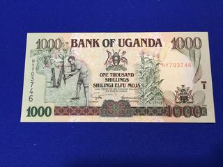 Bank Of Uganda One Hundred Thousand Shillings Bill. S/N NY703746.