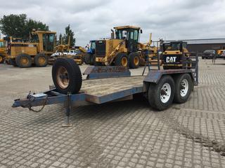 1981 12 Ft. CAW T/A Utility Trailer c/w Fold Down Ramps, 7,000 Lbs Axles, Spare Tire, 2-5/16 Ball Hitch, 235/85R16 Tires. S/N 003 **Note: Cracks in Frame**