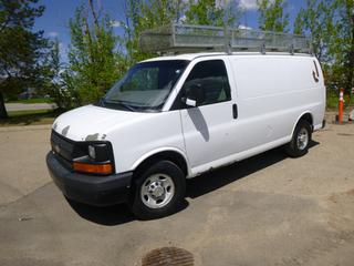 2012 Chevrolet Express Van, C/w 4.8L V8, Gas, A/C, Roof Rack w/ Storage Cage 12 Ft. 1 In. x 3 Ft., Wood Bed Liner In Cargo Area w/ Wood Storage Shelf, Partition Between Cab and Cargo Area, Ladder to Roof Mounted on Rear Door, Tire Size 245/75/R16, Axle Rating 4100 Lbs Front, 5360 Lbs Rears,  Showing 230,629 Kms, 4988 Hours, VIN 1GCWGFCA5C1103958 *Note:   Service Air Bag Light On, Service Traction Control Light On, Service Stabilitrak Light On, Drivers Seat Shows Wear and Tear*