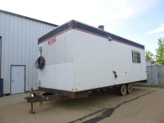 1998 National Trailer MFG. LTD. 10 Ft. x 24 Ft. T/A Office Trailer C/w 2 5/16 In. Ball Hitch, Spring Suspension, 4000kg GVWR, 125A, 120/240V, Single Phase, Gas Furnace, (2) Rooms, Side Door, 7 Pin, Telephone Network Interface Box And 8.14.5LT Tires. VIN 2N9MF1323W1013577 *Note: Window Broken*