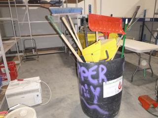 Bin Of Brooms, Shovels, Rakes And Ice Chippers