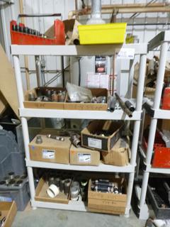 4-Tier Shelving Unit C/w Contents Includes Steel Nipples and Holders *Note: Buyer Responsible for Load Out*