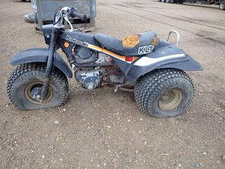 Kawasaki KLT-ATC 200 c/w 22x11.00x8 NHS Tires w/ Box of Spare Parts *Note: Not Running, Tires Cracked*