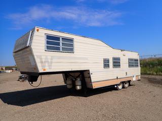 1977 Winnebago 527CS 26 Ft. 5th Wheel c/w (2) Propane Tanks, Awning, P205/75R14 Tires, VIN 237730606820 *Note: No Furnace, Fridge and Stove Working Condition Unknown, Needs Repair Inside*