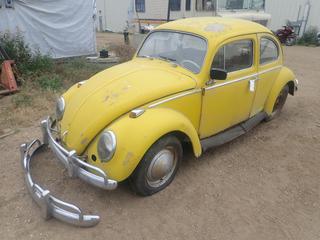 1963 1200 Volkswagen Beetle c/w 4 Cylinder, Manual, 34 HP, Perfection Aux Heater, Extra Bumper, Showing 4176 Miles, VIN 5917896 *Note: Hole In Floor, Flat Tires, Does Not Run*