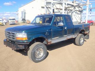 1996 Ford F-150 XLT 4X4 Pickup c/w 5.8L EFI V8, Delta 70 In. x 20 In. x 20 In. Bin Storage Box, 6 In. Lift, Transmission Temp. Gauge, Pressure Gauge, 33x12.50R15 LT Tires, (2) Spare Tires, (2) Fuel Tanks, Short Box, Showing 264,573 Kms, VIN 1FTEX14H0TKA50011 *Note: Dents, Scratches, Rust*